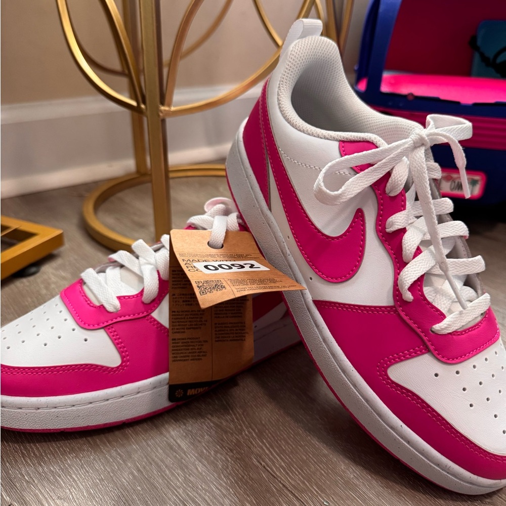 Nike Court Borough Low Recraft sneakers in White and Laser Fuchsia.